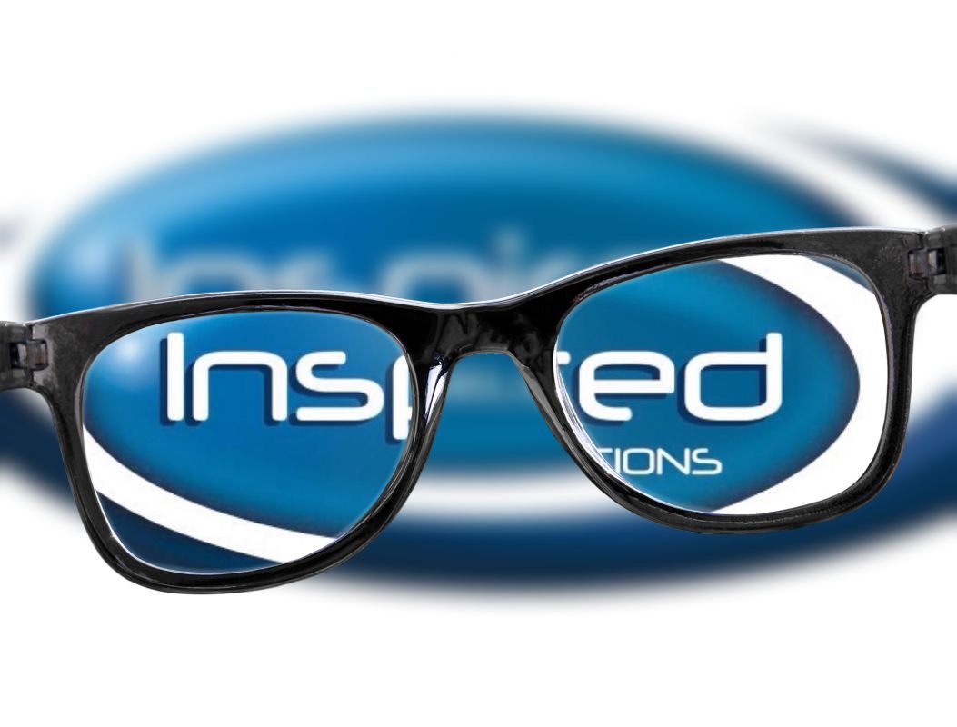 a pair of glasses over the inspired recruitment logo